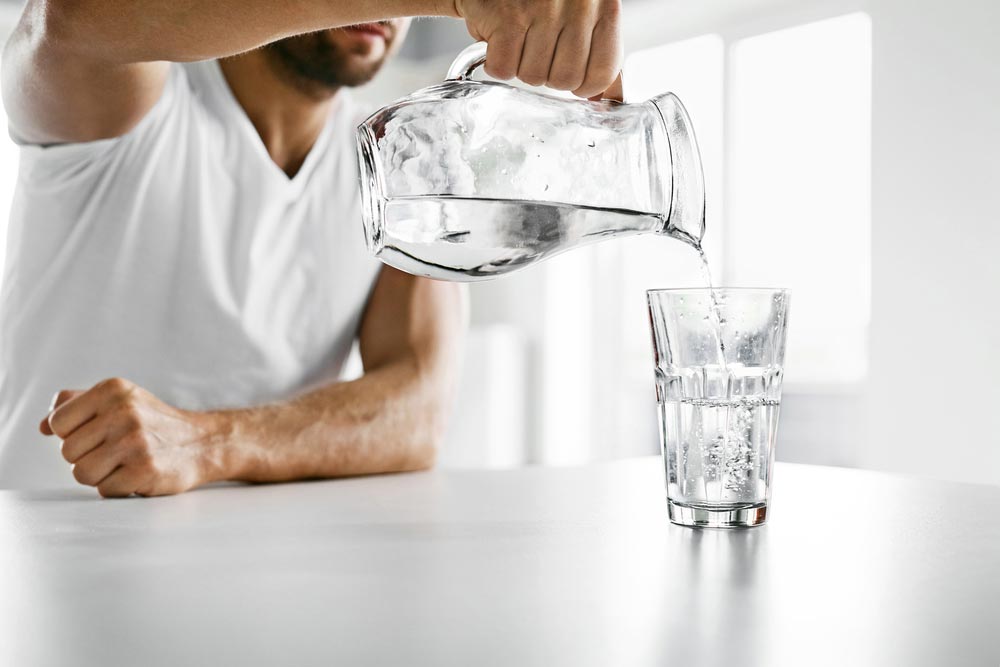 A man pouring water